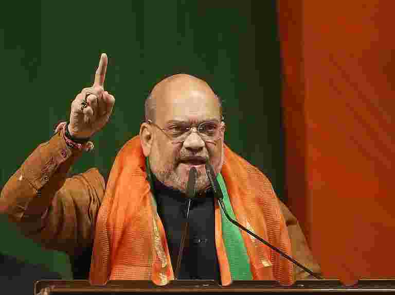 没有公司可以抢夺农民的土地，直到Modi是PM：amit shah.